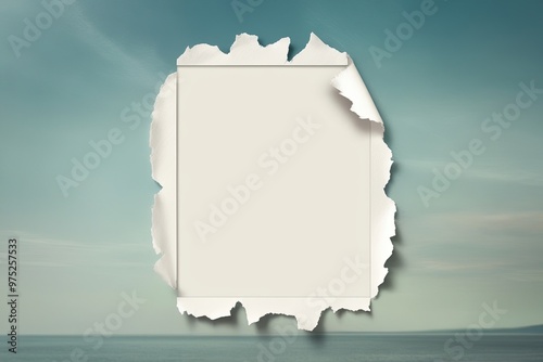 Torn Paper Layout Design with Jagged Edges on a Serene Background photo