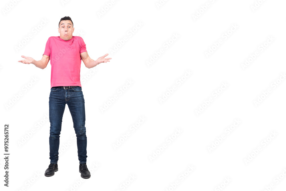 Young male shrugging shoulders and looking puzzled in studio Young male shrugging shoulders and looking puzzled in studio