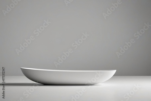 a white bowl on a table 