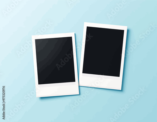 Two Blank Polaroids on Blue Background
