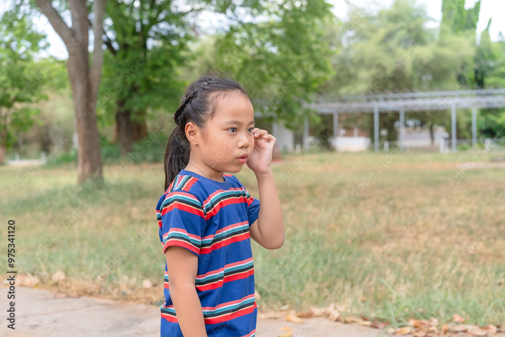 A young child stood in the park with a curious expression on his face. Her eyes widened. While staring around The girl thought deeply. and was pondering something that caught her attention. A young child stood in the park with a curious expression on his face. Her eyes widened. While staring around The girl thought deeply. and was pondering something that caught her attention.