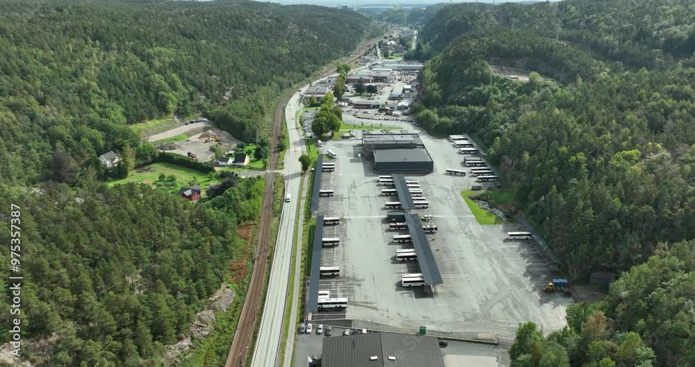 Electric buses charging in a bus facility 2