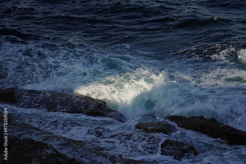 waves breaking on the rocks