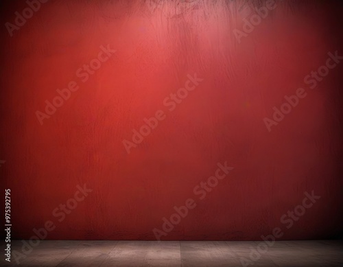 A red wall with a dark wooden floor in the foreground.