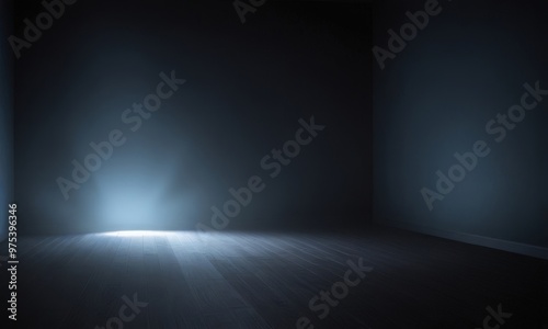 A dimly lit room with a single spotlight shining on a wooden floor, creating a sense of depth and mystery.