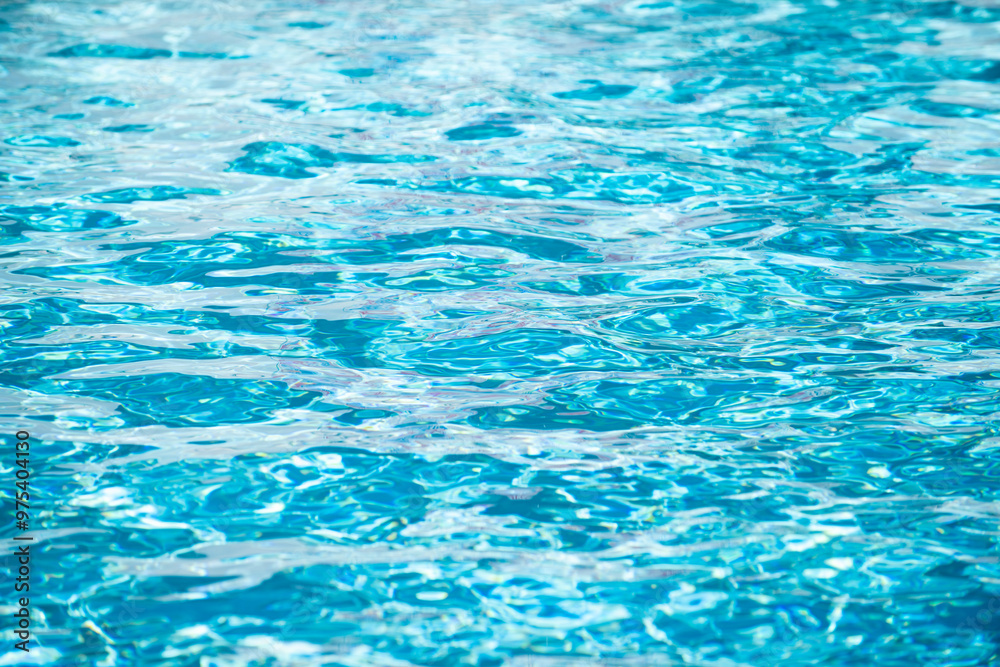 Blue ripped water in swimming pool, water pool texture and surface water backgraund.