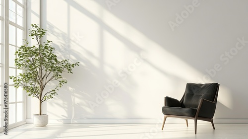 A minimalist living room with a black armchair and a potted plant in front of a large window with sunlight streaming through.