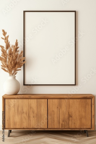 Minimalist Interior with Wooden Sideboard and Blank Frame Mockup in Neutral Tones, Perfect for Wall Art Display or Poster Presentation
