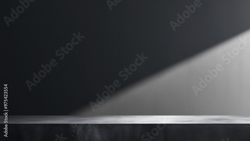 Minimalist modern design with a dark monochromatic color scheme, featuring a textured concrete surface, smooth dark wall, and a dramatic diagonal light beam, generative ai