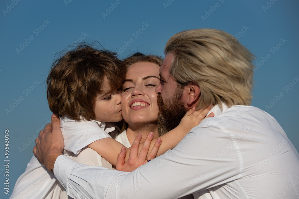 Happy Family hug. Hugging family portrait. Parents hugging and bonding together. Mom and dad embrace with child. Support and care Family. Parents hugging with child. Family love.