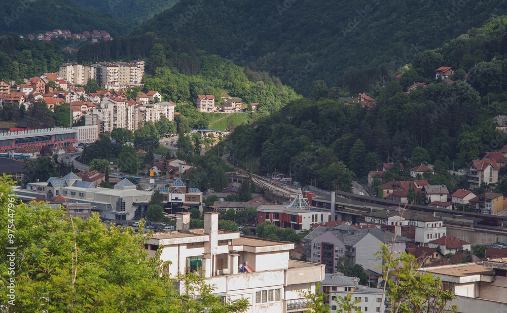 Naklejka premium View of the small town with high-rise buildings and streets
