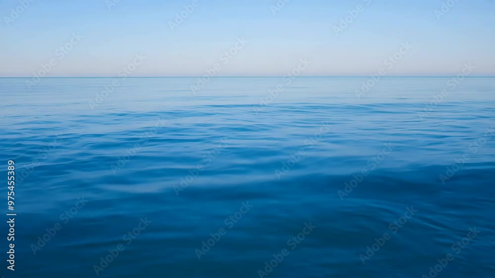 Calm Blue Ocean Horizon: Tranquil Water Surface
Calm Blue Ocean Horizon: Tranquil Water Surface