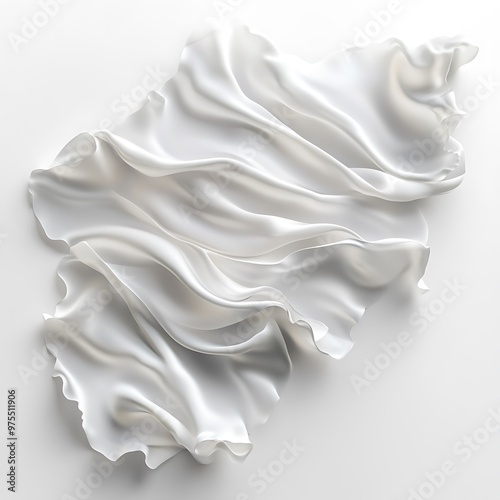 A piece of white fabric is draped on a white background. It is crumpled and has many folds and creases.