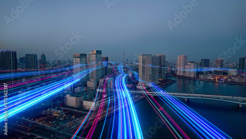 Photography Mixed media of modern city aerial view and path of light leading to the future concept