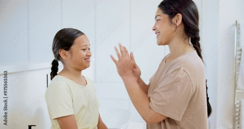 Skincare, beauty and mother with kid in bathroom for facial cream, lotion or spf at home. Dermatology, cosmetic and young mom helping girl child with face routine or treatment in modern house. Skincare, beauty and mother with kid in bathroom for facial cream, lotion or spf at home. Dermatology, cosmetic and young mom helping girl child with face routine or treatment in modern house.