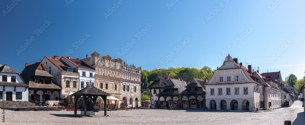 Summer skyline cityscape of Kazimierz Dolny, Lesser Poland (Małopolska). Wide panoramic view of Old Town market square Summer skyline cityscape of Kazimierz Dolny, Lesser Poland (Małopolska). Wide panoramic view of Old Town market square