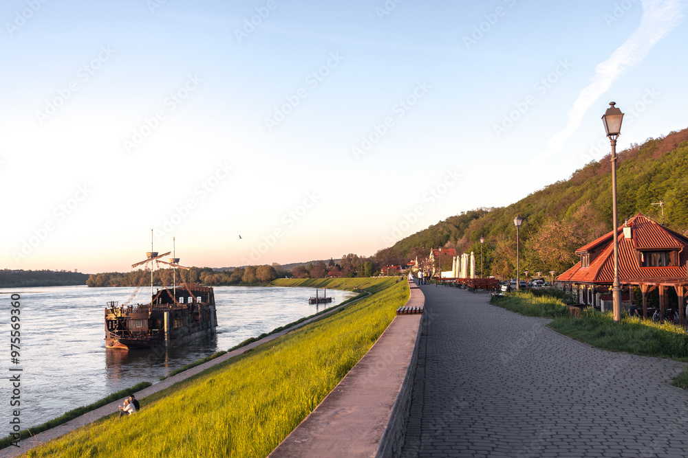 Wisla quay (Bulwar Nadwiślański) in Kazimierz Dolny, Lesser Poland (Małopolska). Evening view at sunset.