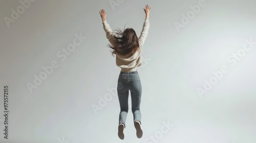 Woman Jumping in Studio