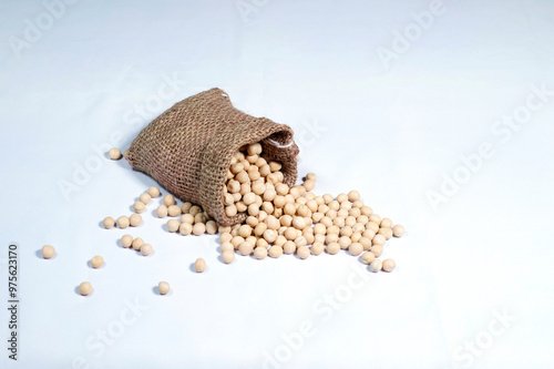 A jute sack of peas isolated on a white background