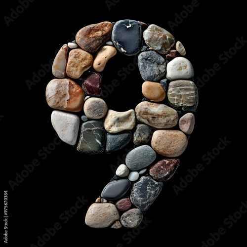 Stone Number 9, Alphabet 9 Made of Stones Isolated on Black Background, Textured Typography with Pebbles photo