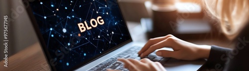 Wallpaper Mural Person typing on a laptop with the word Blog on the screen, indicating online writing, digital content creation, or blogging work. Torontodigital.ca