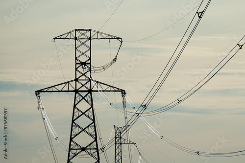 power line and wires close-up against blue sky