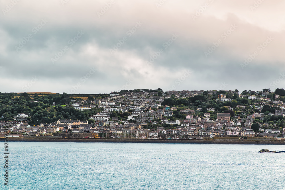 Fototapeta premium Coastal Town Overlooking Calm Sea in Penzance, Cornwall, UK