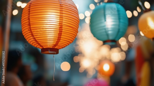 Colorful paper lanterns hanging at night street festival