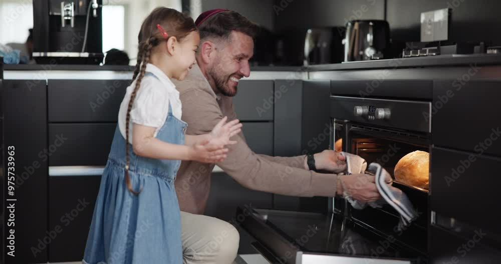 Family, baking and a father with his daughter in the kitchen to remove fresh bread from the oven. Children, love and a dad teaching his girl child hot to bake while cooking in their apartment Family, baking and a father with his daughter in the kitchen to remove fresh bread from the oven. Children, love and a dad teaching his girl child hot to bake while cooking in their apartment