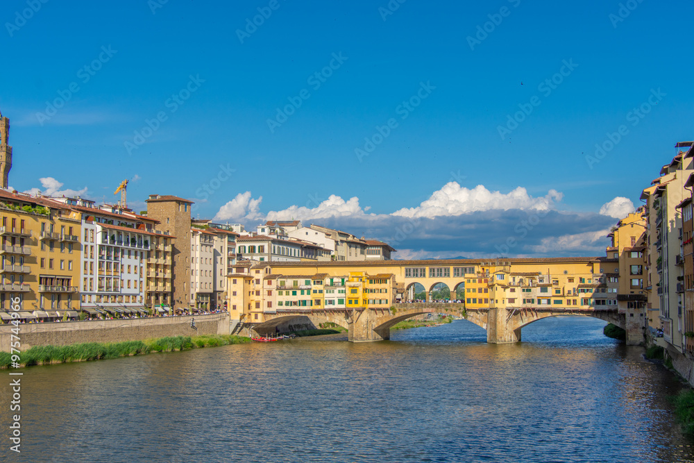 Naklejka premium View of the famous Ponte Vecchio over the Arno river in the city of Florence in Italy.