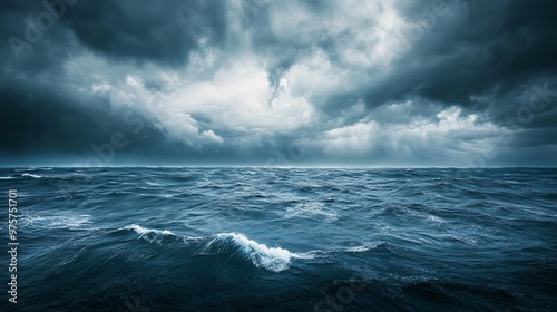 A dramatic seascape with strong winds and dark, overcast skies, signaling an approaching rainstorm. 