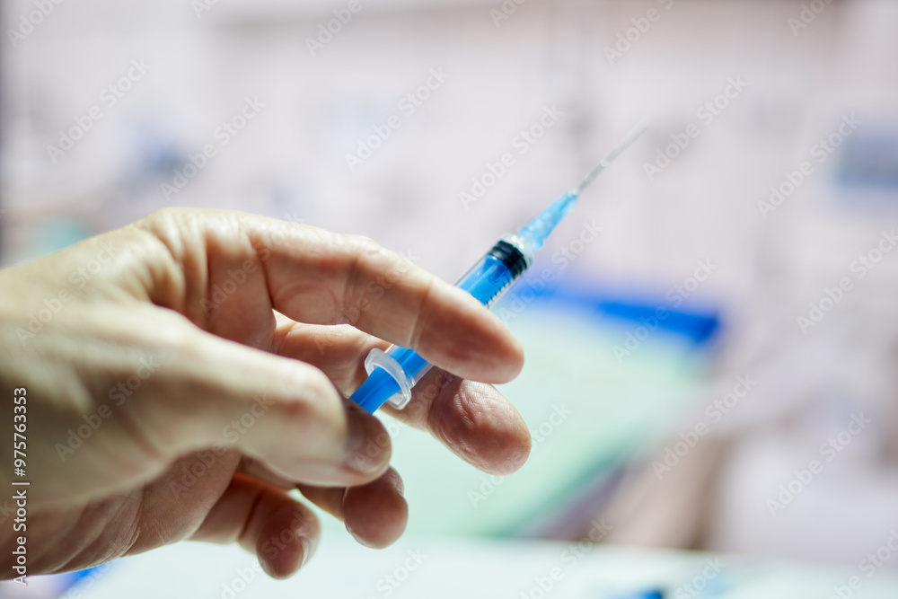 syringes lie on the table in the intensive care unit syringes lie on the table in the intensive care unit