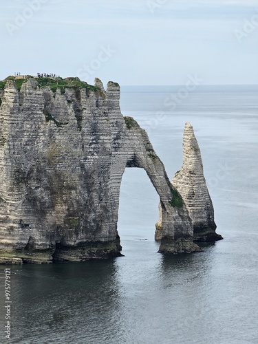 Normandy, France - May 18, 2024: Picturesque panoramic landscape on the cliffs of Etretat. Natural amazing cliffs. Etretat, Normandy, France, La Manche or English Channel. Coast of the Pays de Caux ar