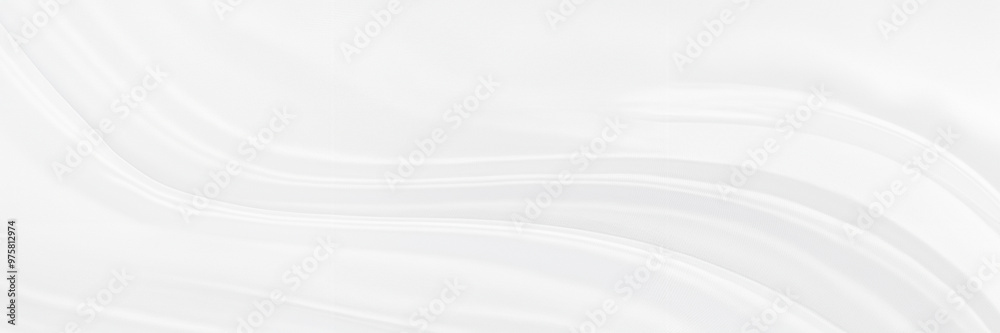 White Satin Fabric with Soft Silver Blur Background White Satin Fabric with Soft Silver Blur Background