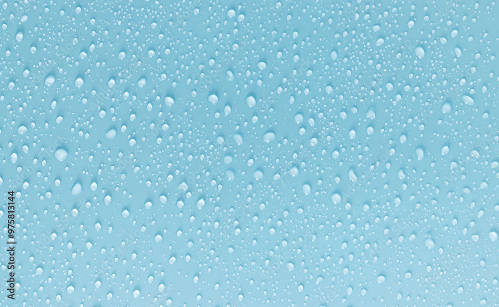 Close-up of Water Droplets on a Smooth Blue Surface Close-up of Water Droplets on a Smooth Blue Surface