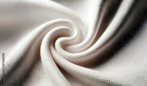 The fabric is folded and twisted, creating a swirling pattern. photo