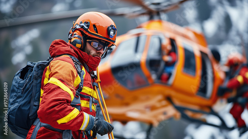 Rescue workers prepare for mission with helicopter in background