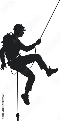 Silhouette of a Rock Climber Rappelling Down