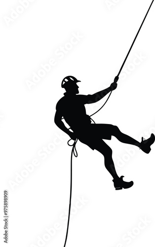 Silhouette of a Rock Climber Rappelling Down