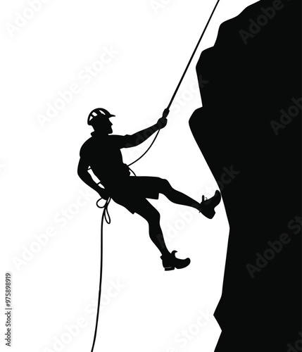 Silhouette of a Climber Scaling a Steep Rock Face