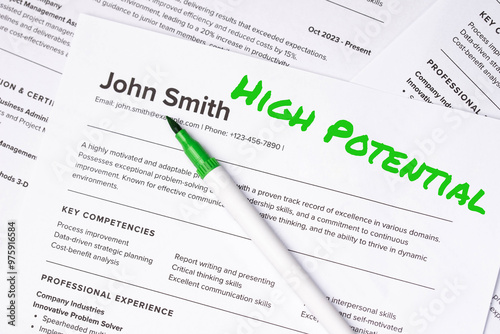 Fake mock CV curriculum vitae) resume for John Smith, selected by HR as perfect candidate for job. Concept of job search, employee selection recruitment process, work and hiring. High Potential photo