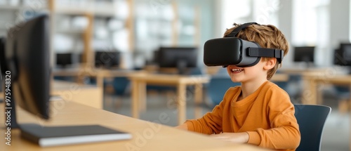 Boy using visuals of multisensory brain-based learning activities, the integration of multiple senses to enhance education. photo