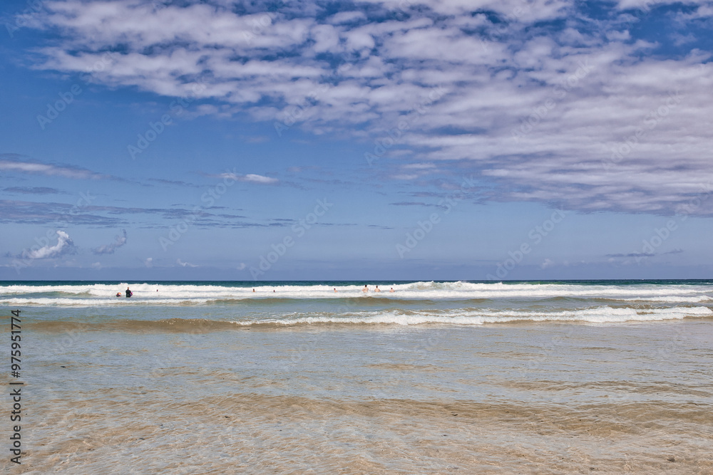 Serene Beach with Gentle Waves at Mawgan Porth Beach, Newquay, Cornwall Serene Beach with Gentle Waves at Mawgan Porth Beach, Newquay, Cornwall