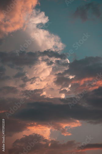 Fototapeta Naklejka Na Ścianę i Meble -  Blue sky with orange clouds during the golden hour.