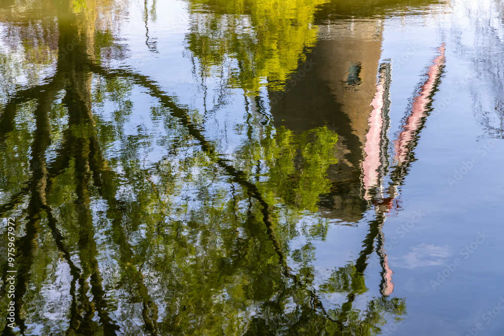 Reflection of a windmill in the village of IJsselstein in the province of Utrecht, Netherlands