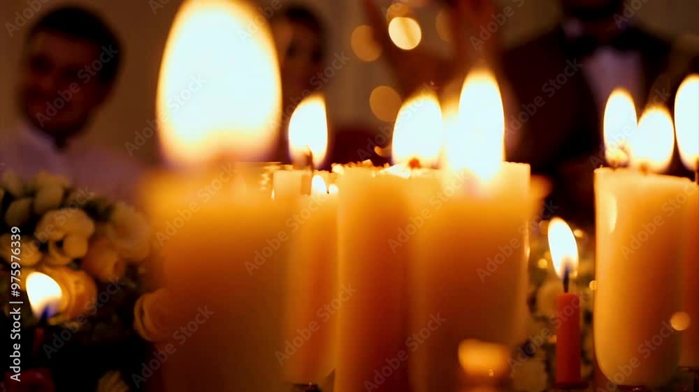 Lot of burning candles on dark background, close up. Lot of burning candles on dark background, close up.