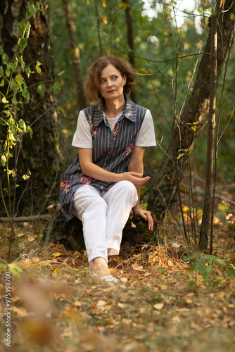 Portrait of a young beautiful girl in the forest.