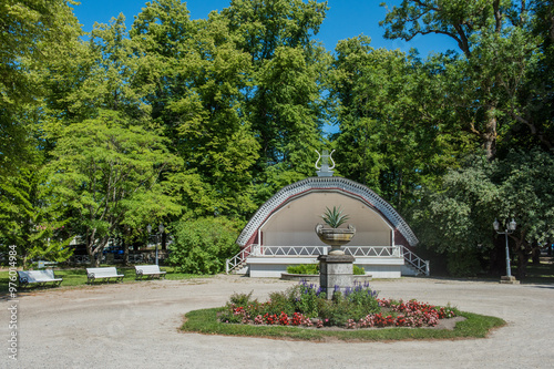 Old rural wooden open-air stage in the park in Kuressaare city centre. Kuressaare, Estonia photo