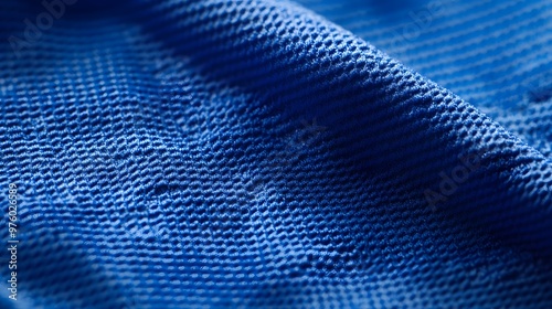 Blue sports jersey fabric texture background, close-up top view