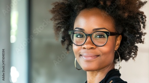 Smiling portrait of a woman wearing glasses